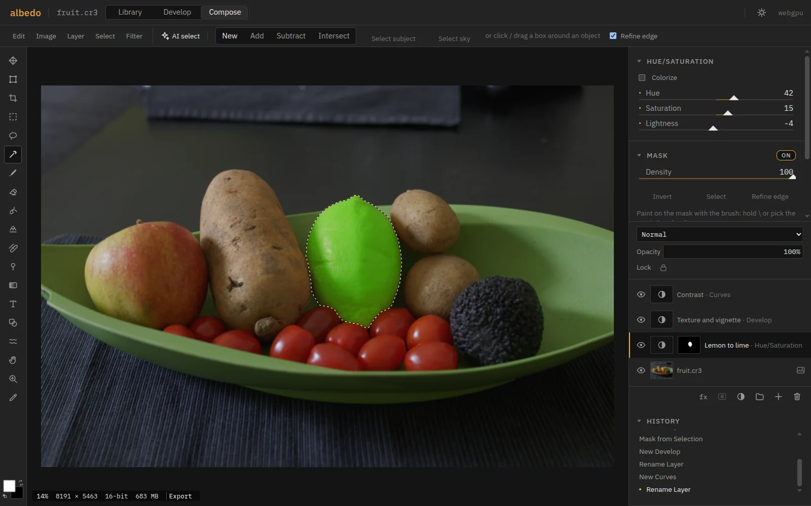 Compose: a bowl of fruit and vegetables. The lemon, selected with one click by AI object selection, is turned lime green by a masked Hue/Saturation layer; Develop and Curves adjustment layers sit above, the RAW below as a smart object.
