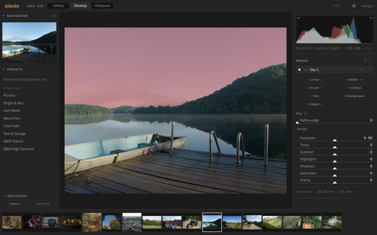 Develop with masks: a lake at dawn, the sky selected by the AI sky mask and shown as a red wash; the Masks panel on the right.